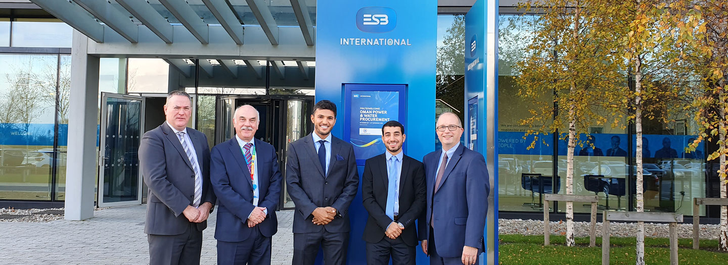 five men in front of ESB International building Omani Delegation Insights